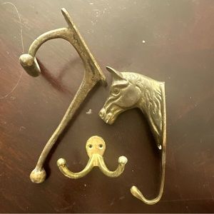 This rare horse 3 piece brass hook set